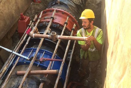 construction worker in a ditch