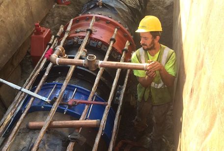 construction worker in a ditch