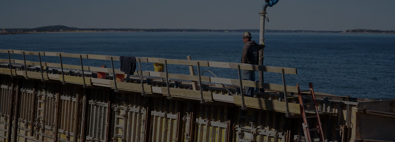 construction worker by water